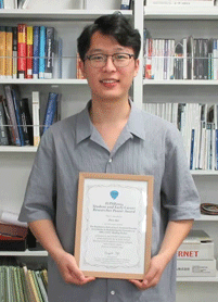 Hauashi-san awarded Hayashi-san awarded